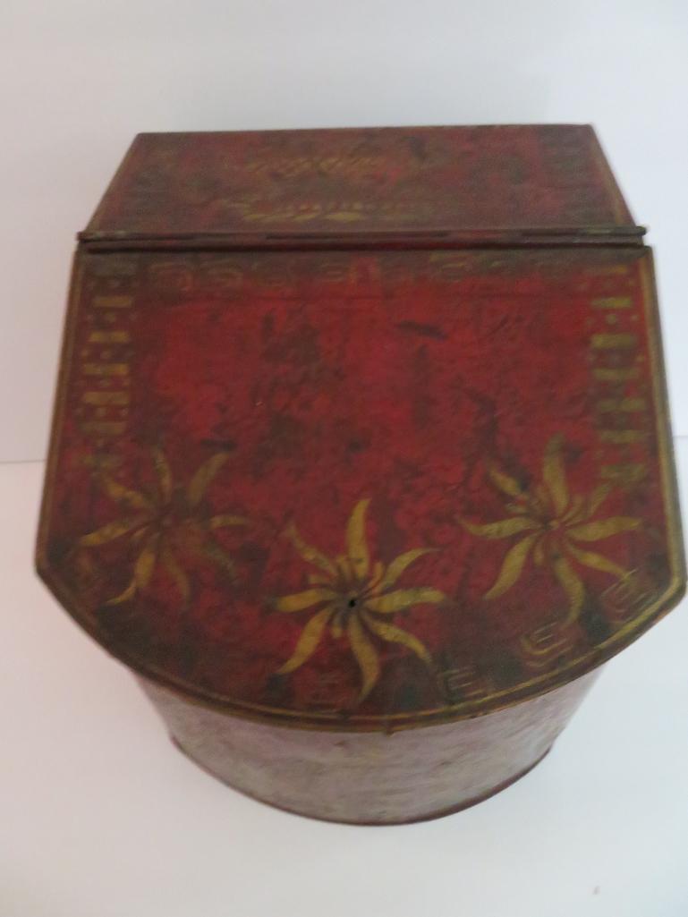 Metal decorated tea tin, lift top, 9" tall and 8" wide