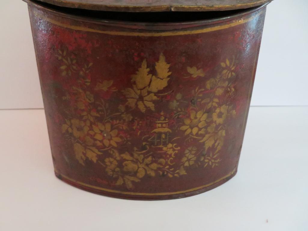 Metal decorated tea tin, lift top, 9" tall and 8" wide