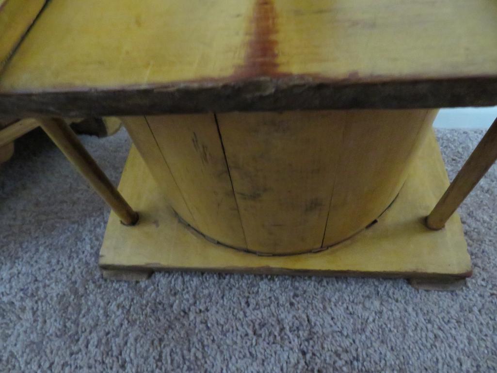 Mustard colored wooden barrel style butter churn, counter top style