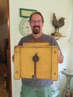 Mustard colored wooden barrel style butter churn, counter top style