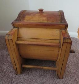 Mustard colored wooden barrel style butter churn, counter top style