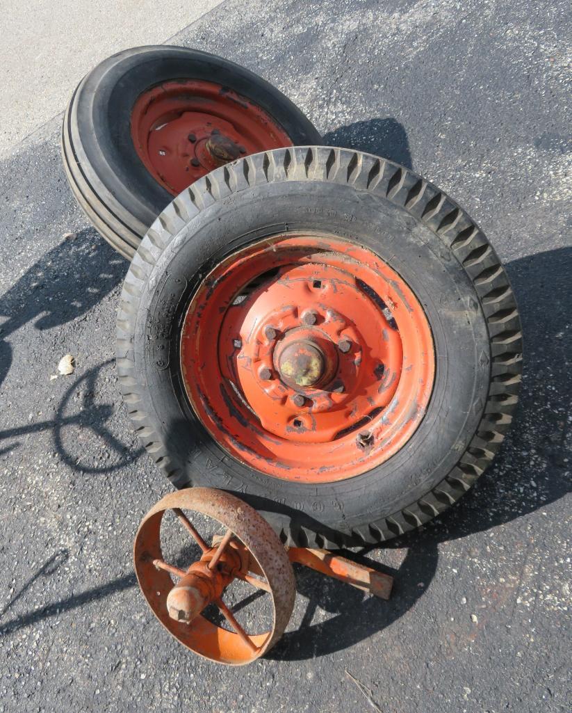 Two implement or wagon tires 6.5 x 16 and 12" Cast iron wheel