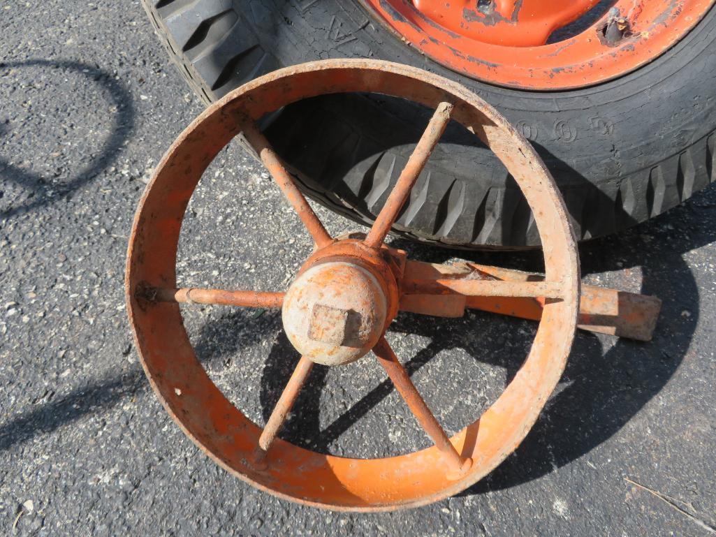 Two implement or wagon tires 6.5 x 16 and 12" Cast iron wheel