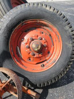 Two implement or wagon tires 6.5 x 16 and 12" Cast iron wheel