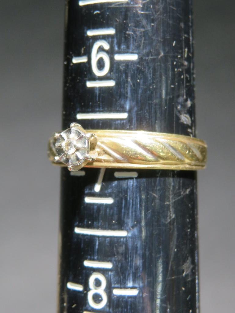 Diamond solitaire ring, marked "10 K", size 6 7/8, with vintage ring box