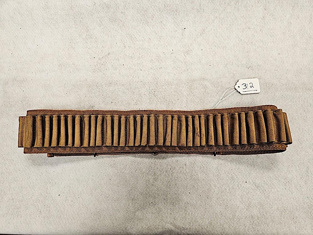 TAN CARTRIDGE BELT, HOLDS 45 ROUNDS, NO AMMO MARKED C BECKER