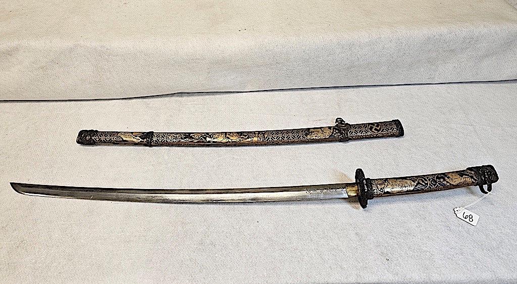 JAPANESE SAMURAI SWORD, DAMASCUS BLADE. THE SYMBOL ON THE SCABBARD WAS A GO