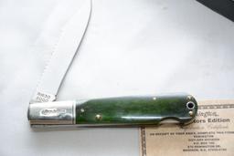 Remington 2000 Millenium Collectible Bullet Knife with mother of pearl, R1630, Lockback, green bone,
