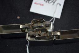 Pair of Zippo Flip-Up Lighters including GM and Ford