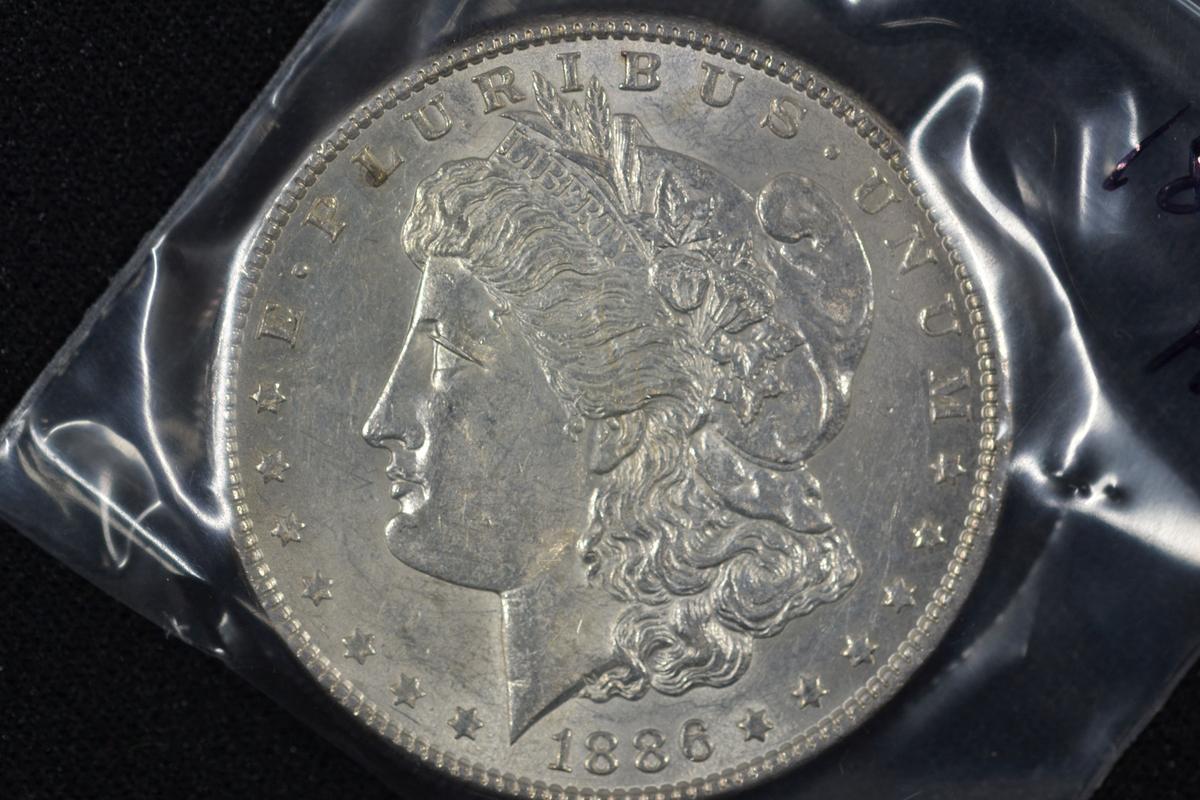 1886 Morgan Dollar; AU