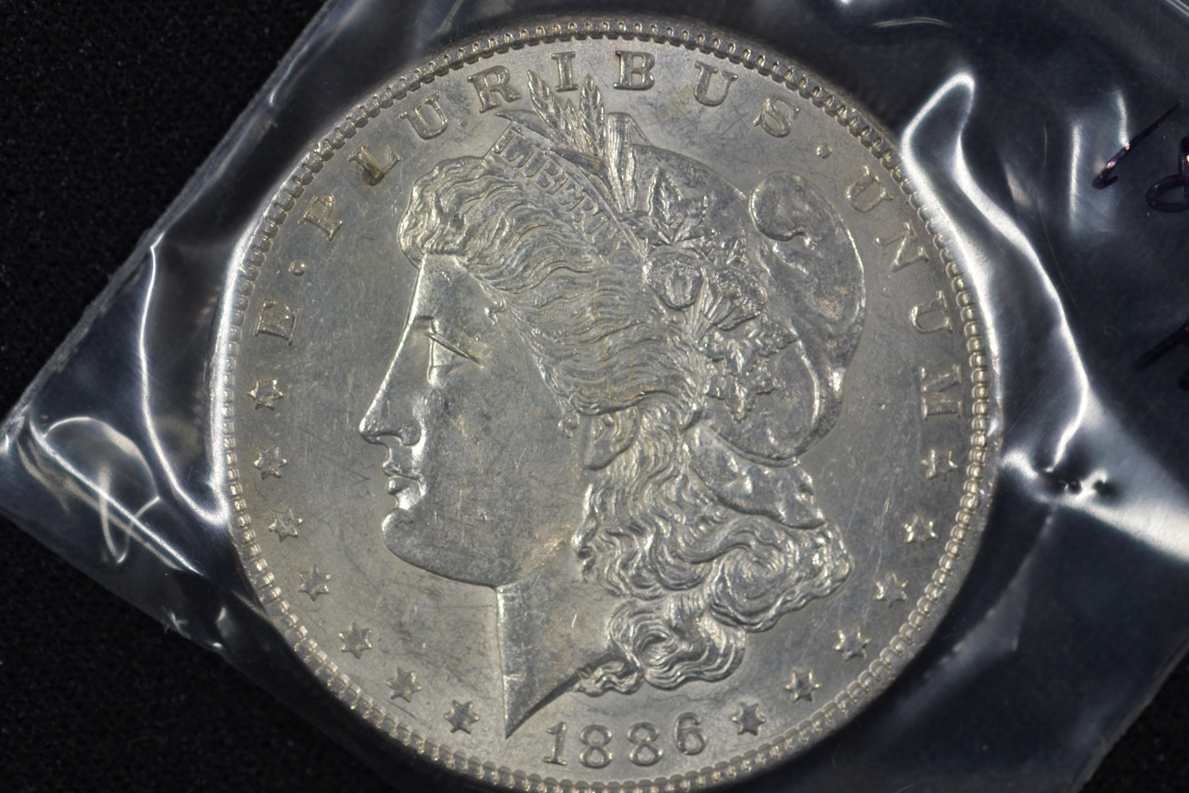 1886 Morgan Dollar; AU