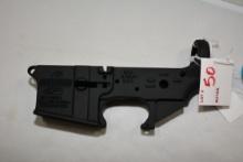 Bushmaster Model XM15-E2S .223-5.56mm Cal. Stripped Lower; SN BK1402557; NIB