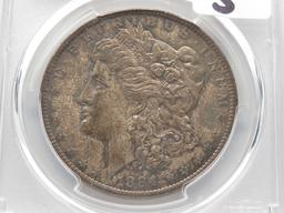 Morgan $ 1884-O PCGS MS63 Toning