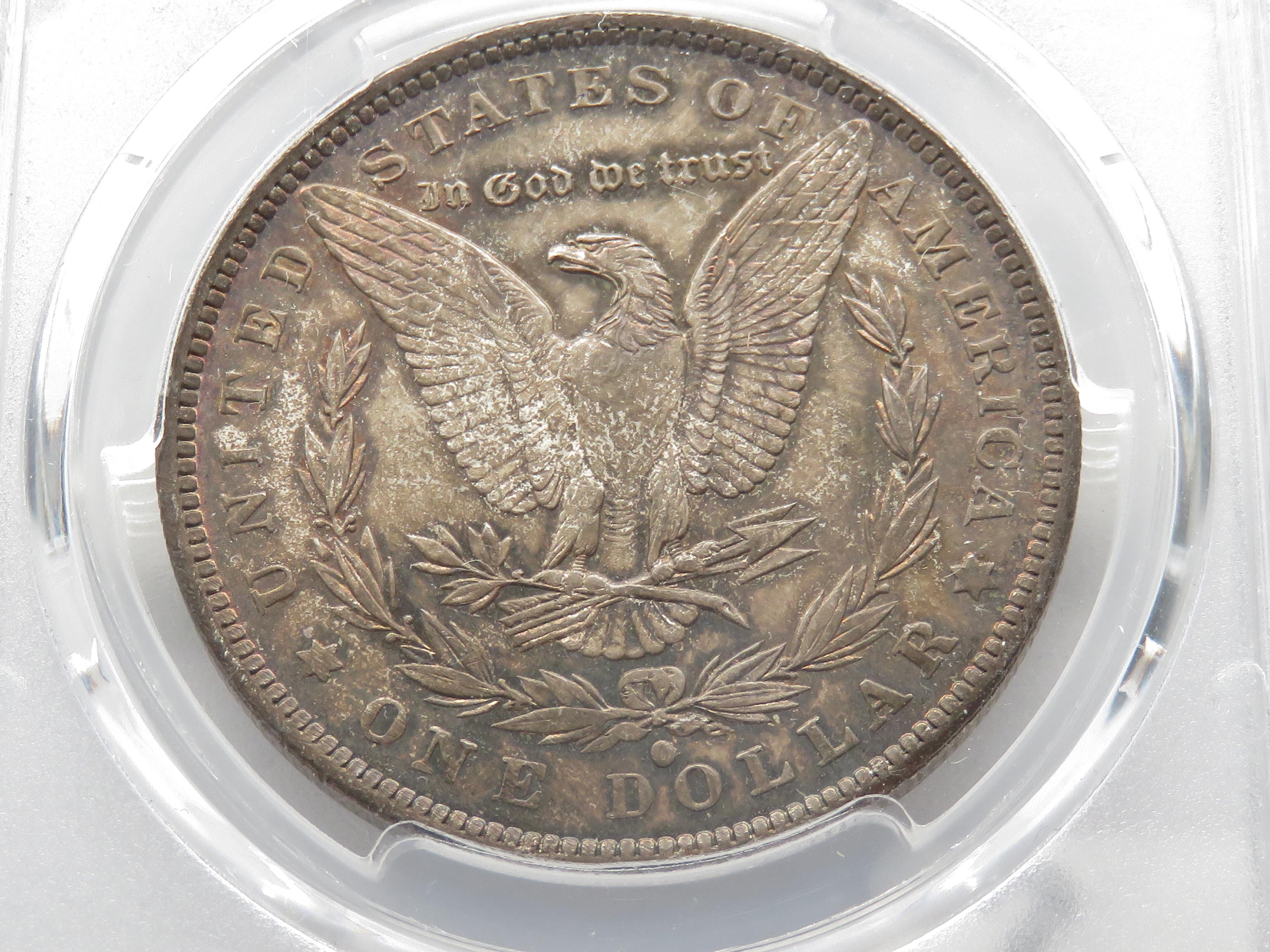 Morgan $ 1884-O PCGS MS63 Toning