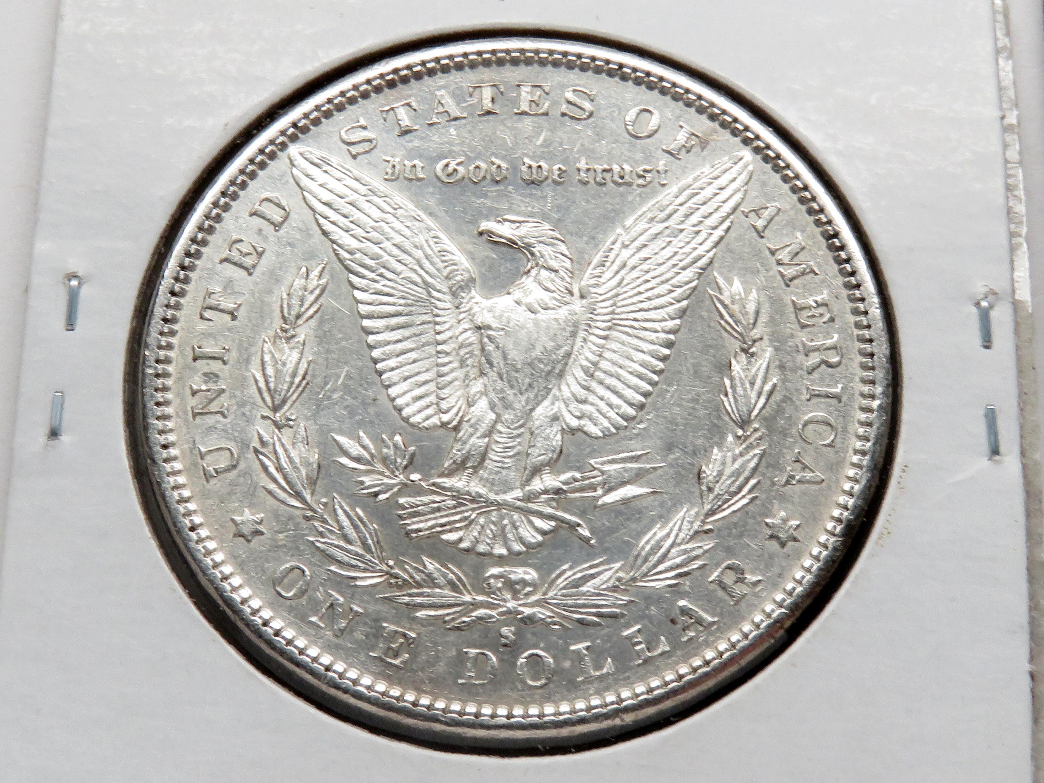 2 Morgan $: 1881S AU, 1883 VF ?cleaned
