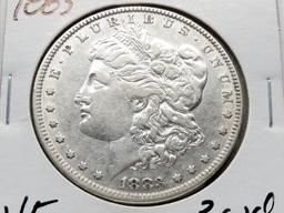 2 Morgan $: 1881S AU, 1883 VF ?cleaned