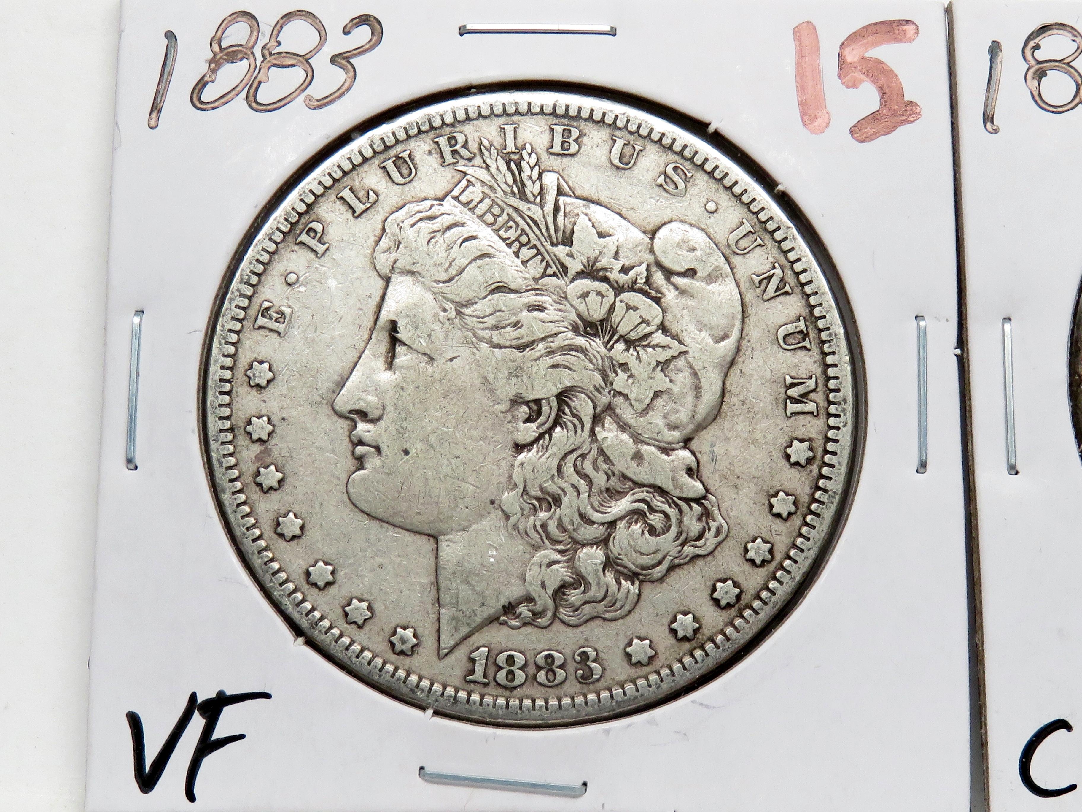 2 Morgan $: 1883 VF, 1886 CH EF