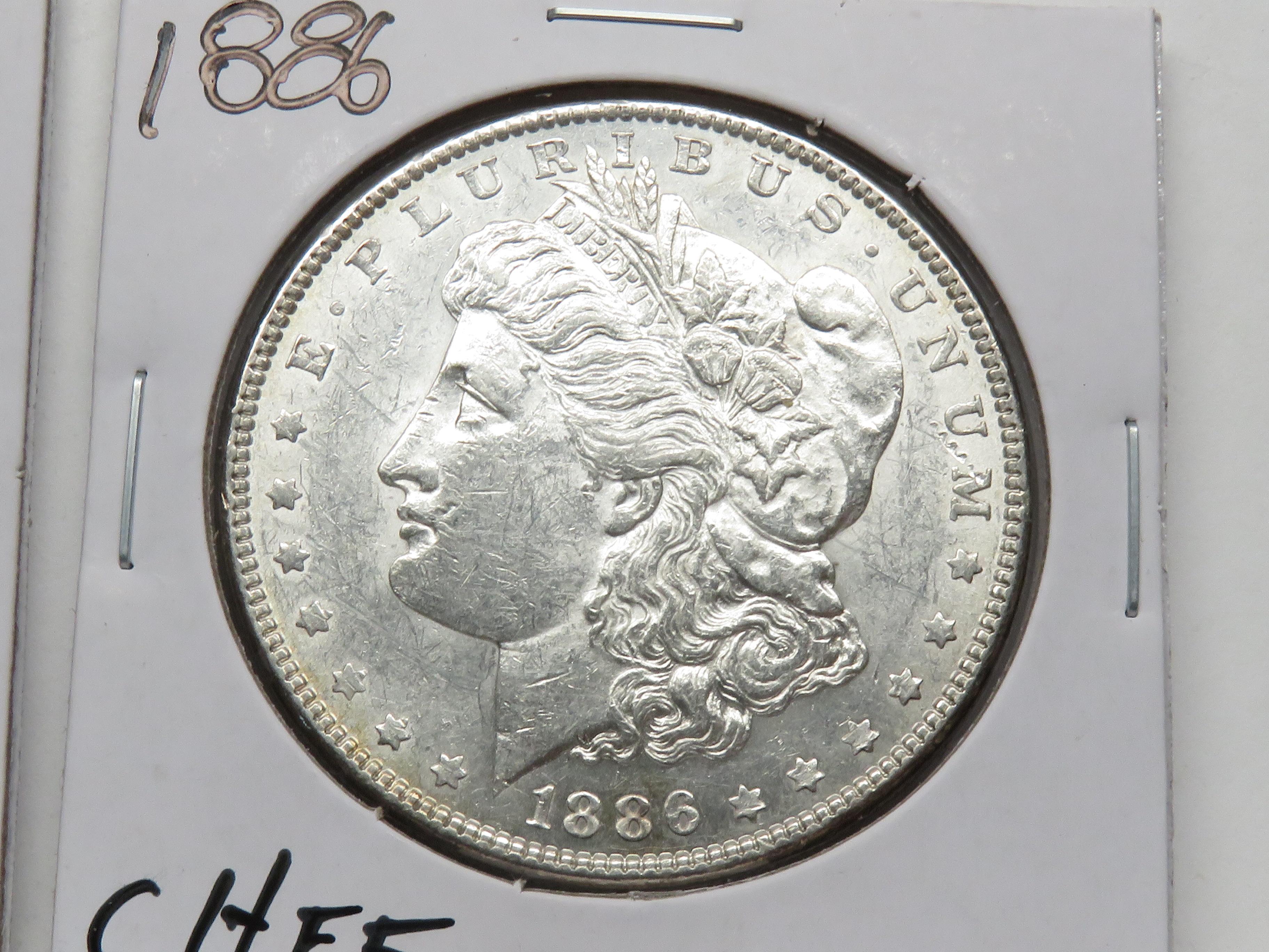 2 Morgan $: 1883 VF, 1886 CH EF