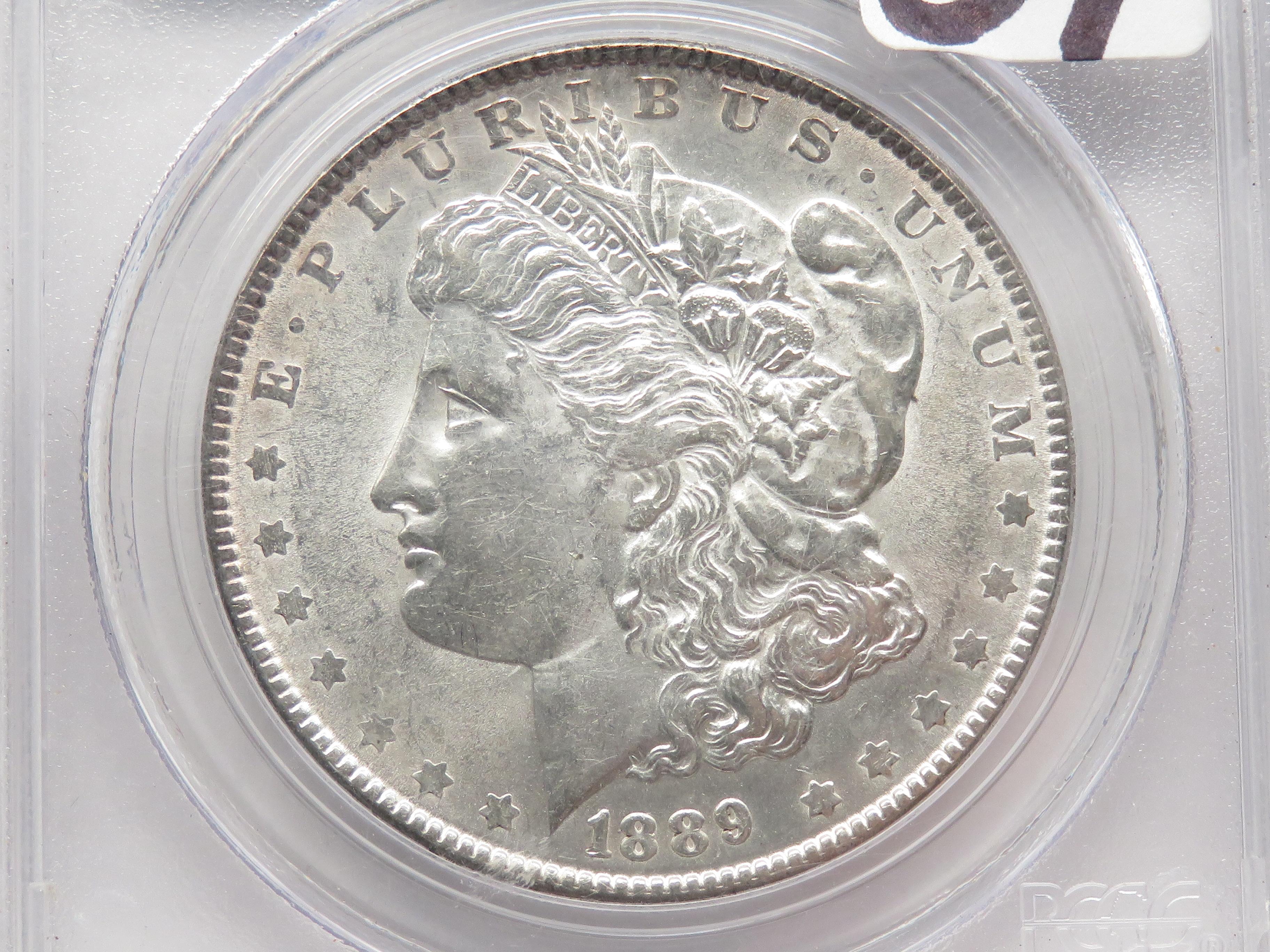 Morgan $ 1889 PCGS AU55