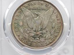 Morgan $ 1886 PCGS MS64 (Nice rainbow toning)