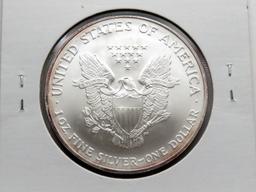 Silver American Eagle 2004 Gem BU light toning