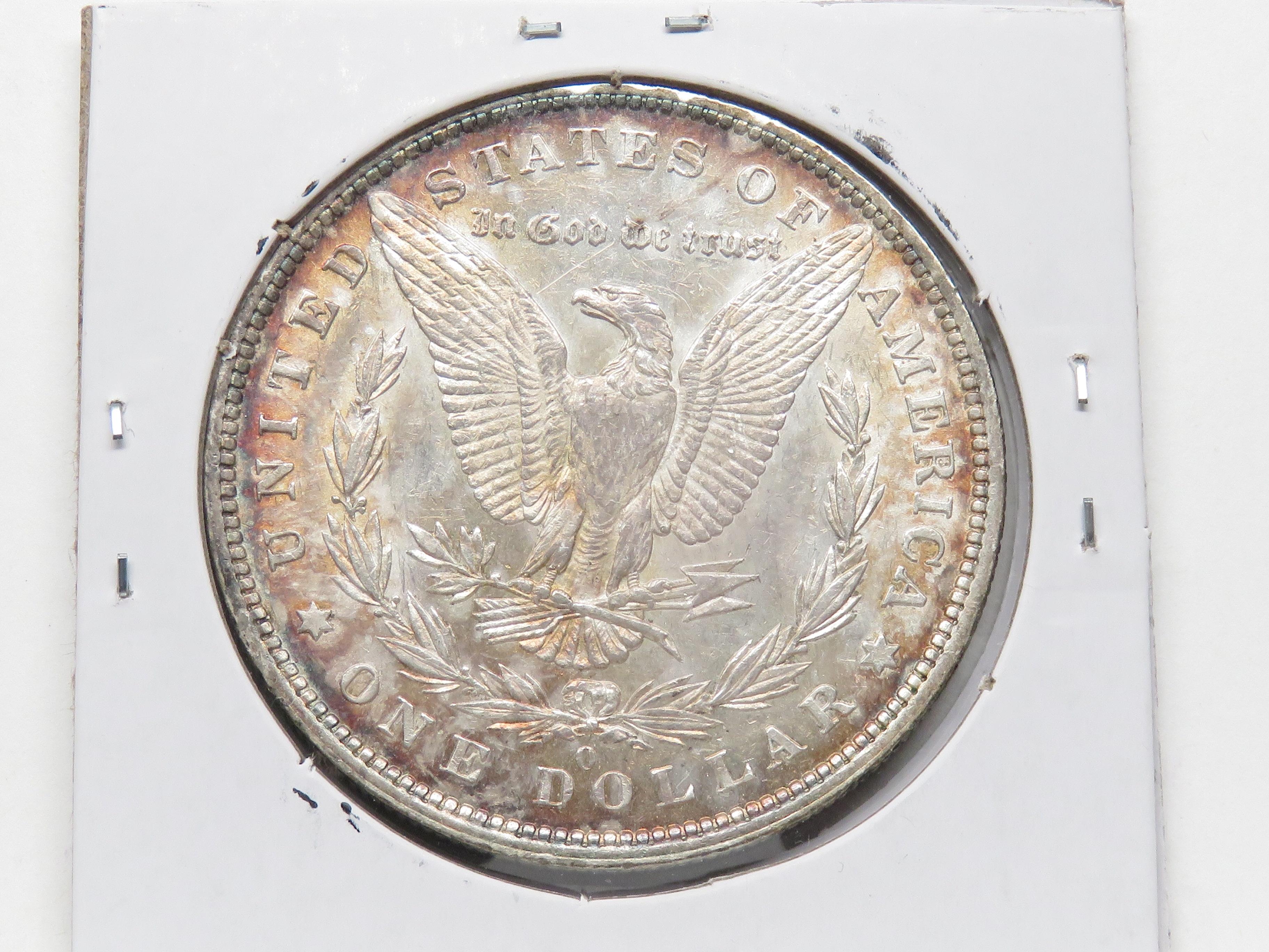 Morgan $ 1879-O Unc toning