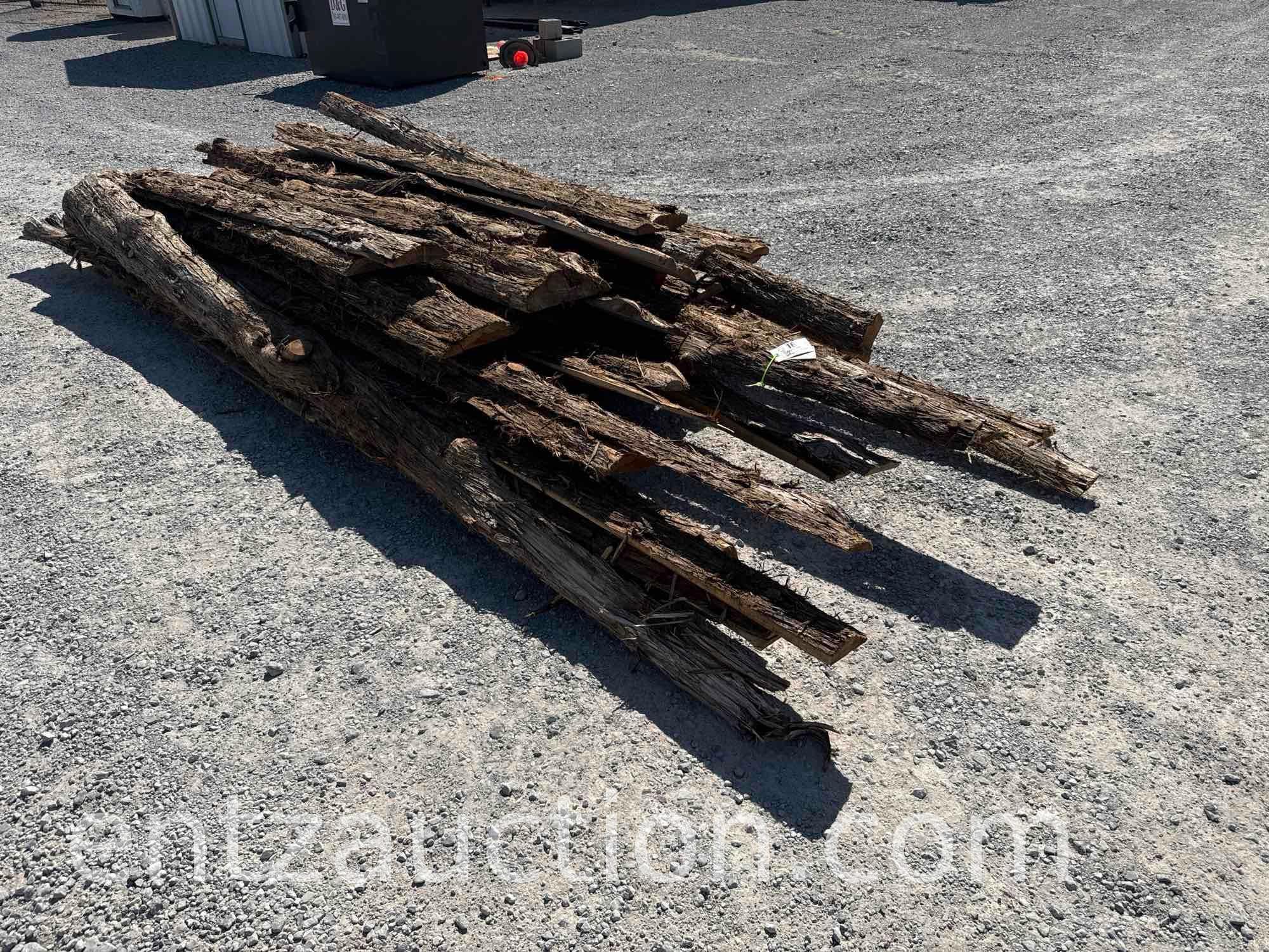 LOT OF APPROX. 40) 1/4 ROUND ROUGH CEDAR PLANKS,