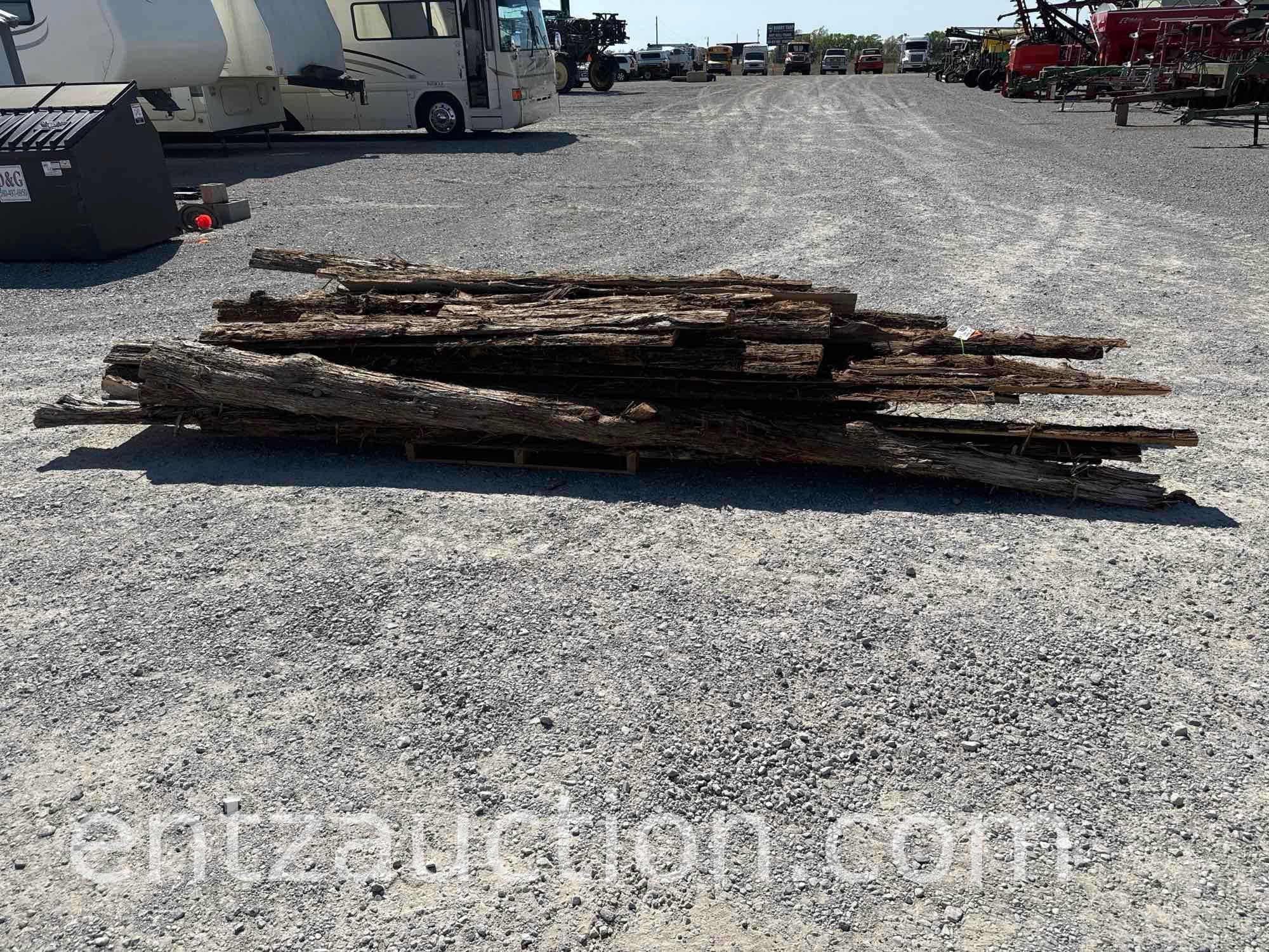 LOT OF APPROX. 40) 1/4 ROUND ROUGH CEDAR PLANKS,