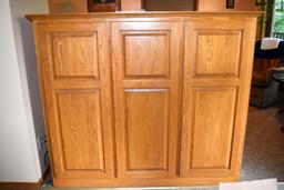 Oak Entertainment Center includes TV only(back opens up with 3 doors)