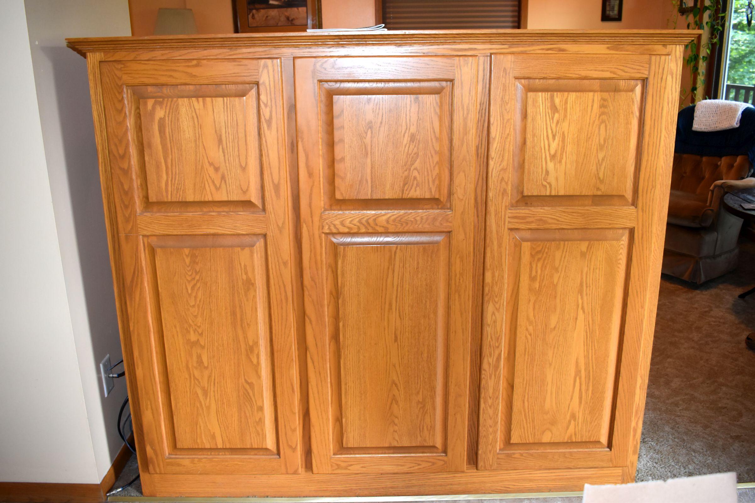 Oak Entertainment Center includes TV only(back opens up with 3 doors)