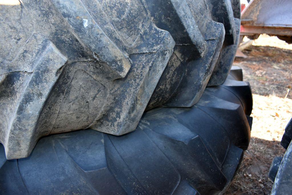Pair Of 13.6x38 Tires, One With 9 Bolt Oliver  Rim
