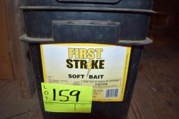 2 pails of mice and rat bait open containers, located building 5