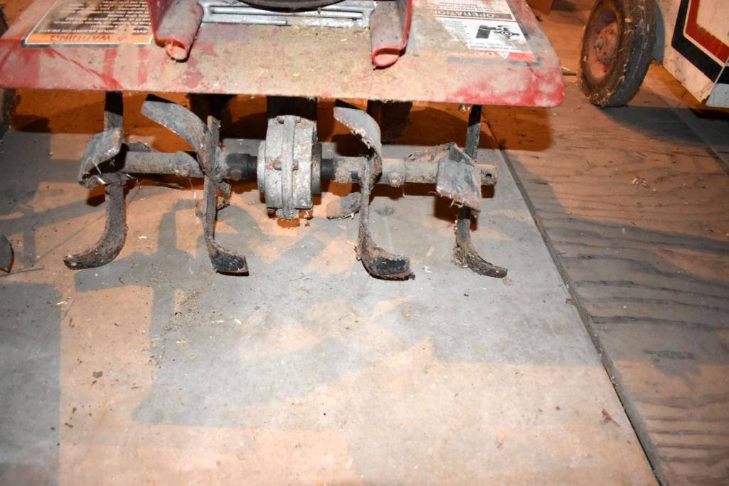 Tecumseh tiller 5.5hp motor, motor is free, located building 6