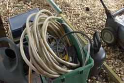 Garden hose, sprayer, watering can, cooler and whirly bird