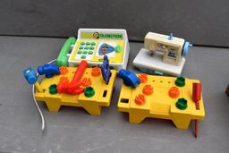 Children's sewing machine, Little Tikes tool sets, and talking phone