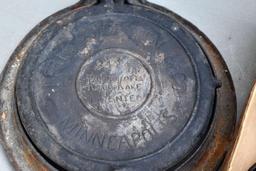 Krumkake iron, cast iron pans, and cast iron ash trays
