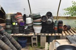 Large assortment of used pots and planters, located in GH 9