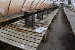 64"x64' and 48"x72' wooden greenhouse garden bench with cinder blocks, located in GH 71