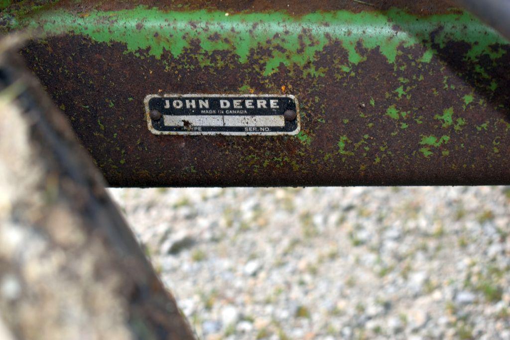 Huskee Model 225 Gravity Box with Hyd. Drive Auger on John Deere 1065 Running Gear