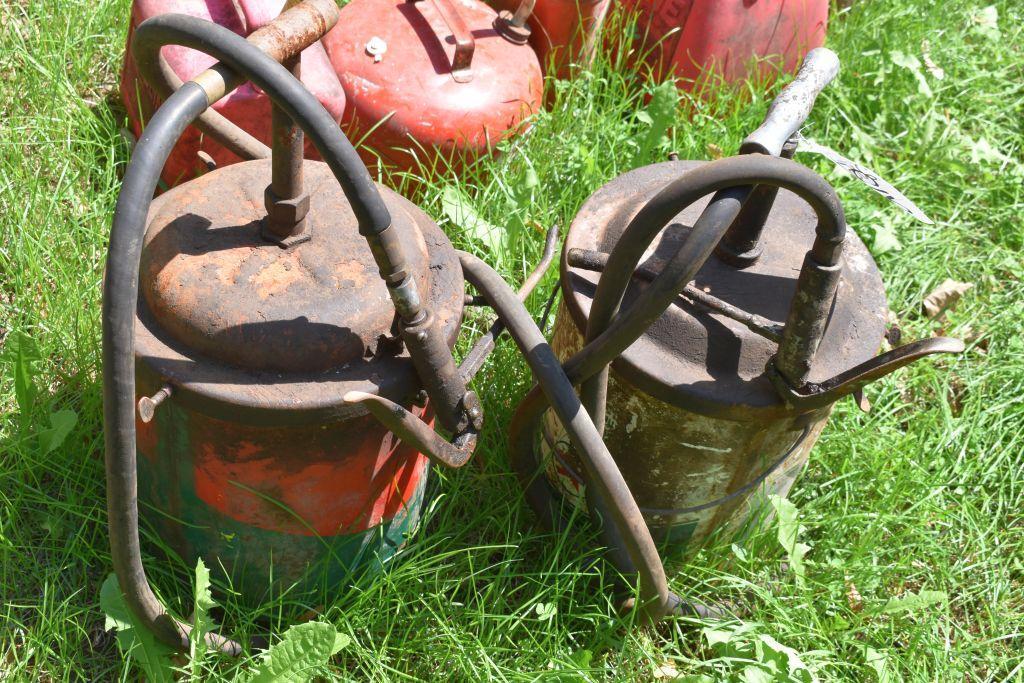 Two grease pails with pumps