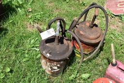 Two grease pails with pumps
