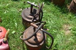 Two grease pails with pumps