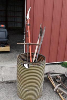 Barrel Containing Fiberglass Handled Limb Trimmer, Post Hole Digger, Scraper, Large Bar