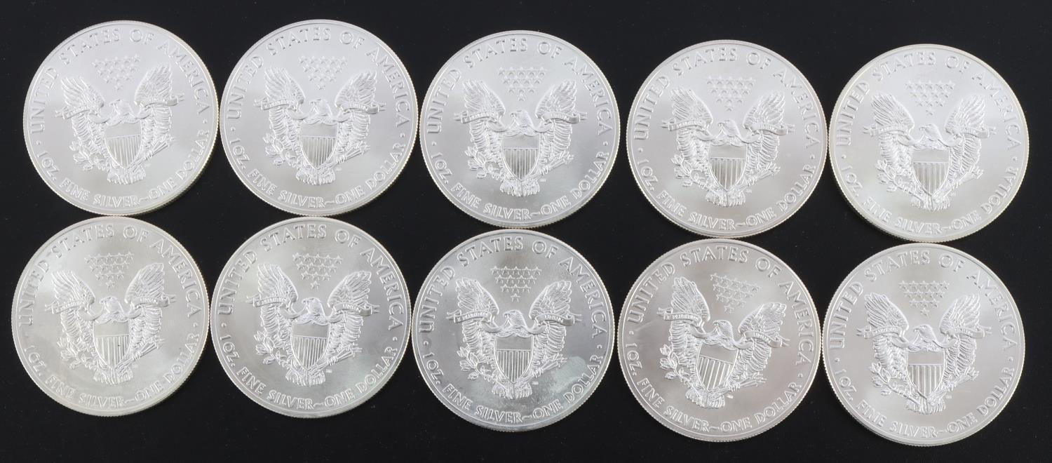 10 AMERICAN EAGLE 1 OZ SILVER DOLLAR COINS