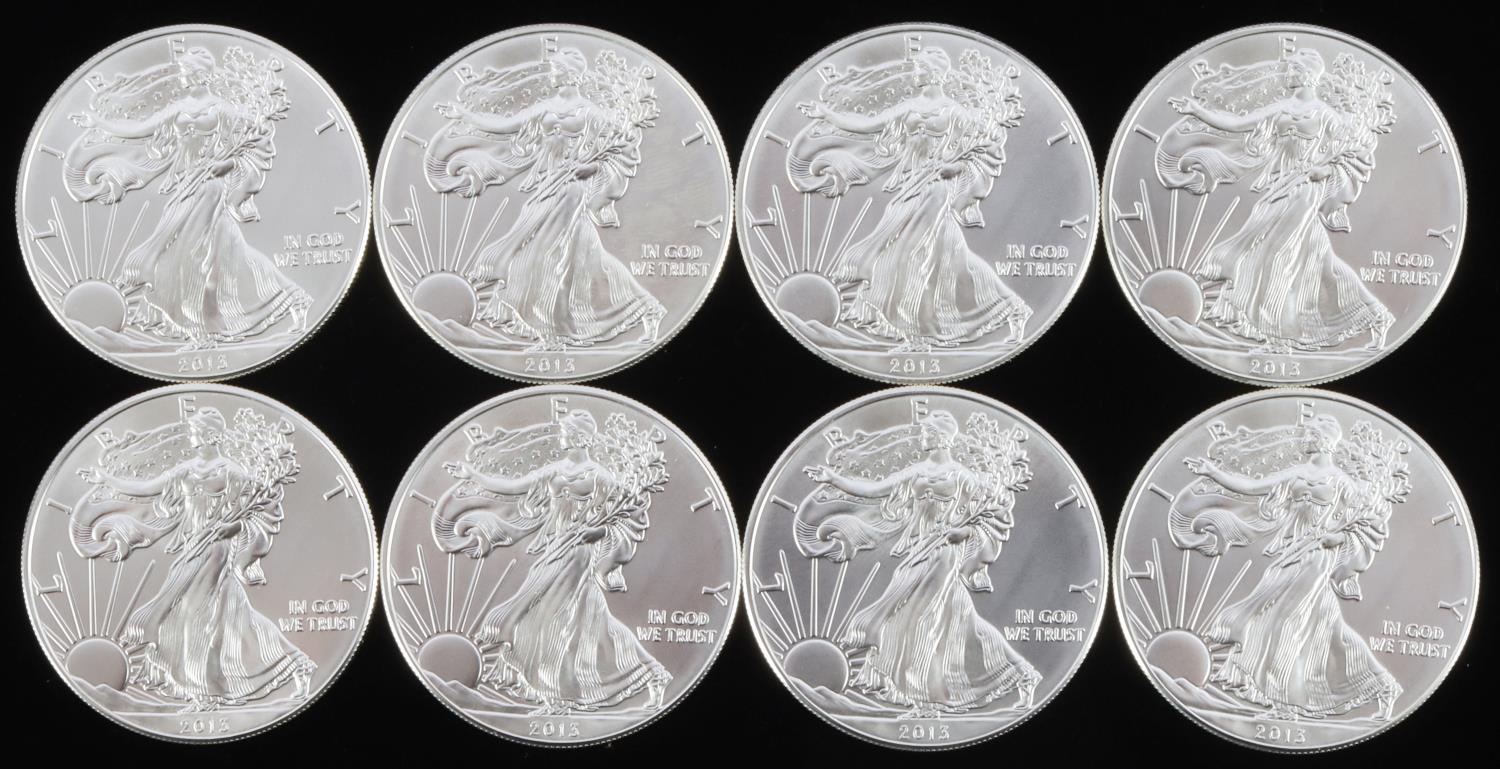 LOT OF 8 AMERICAN EAGLE SILVER 1 OZ COINS