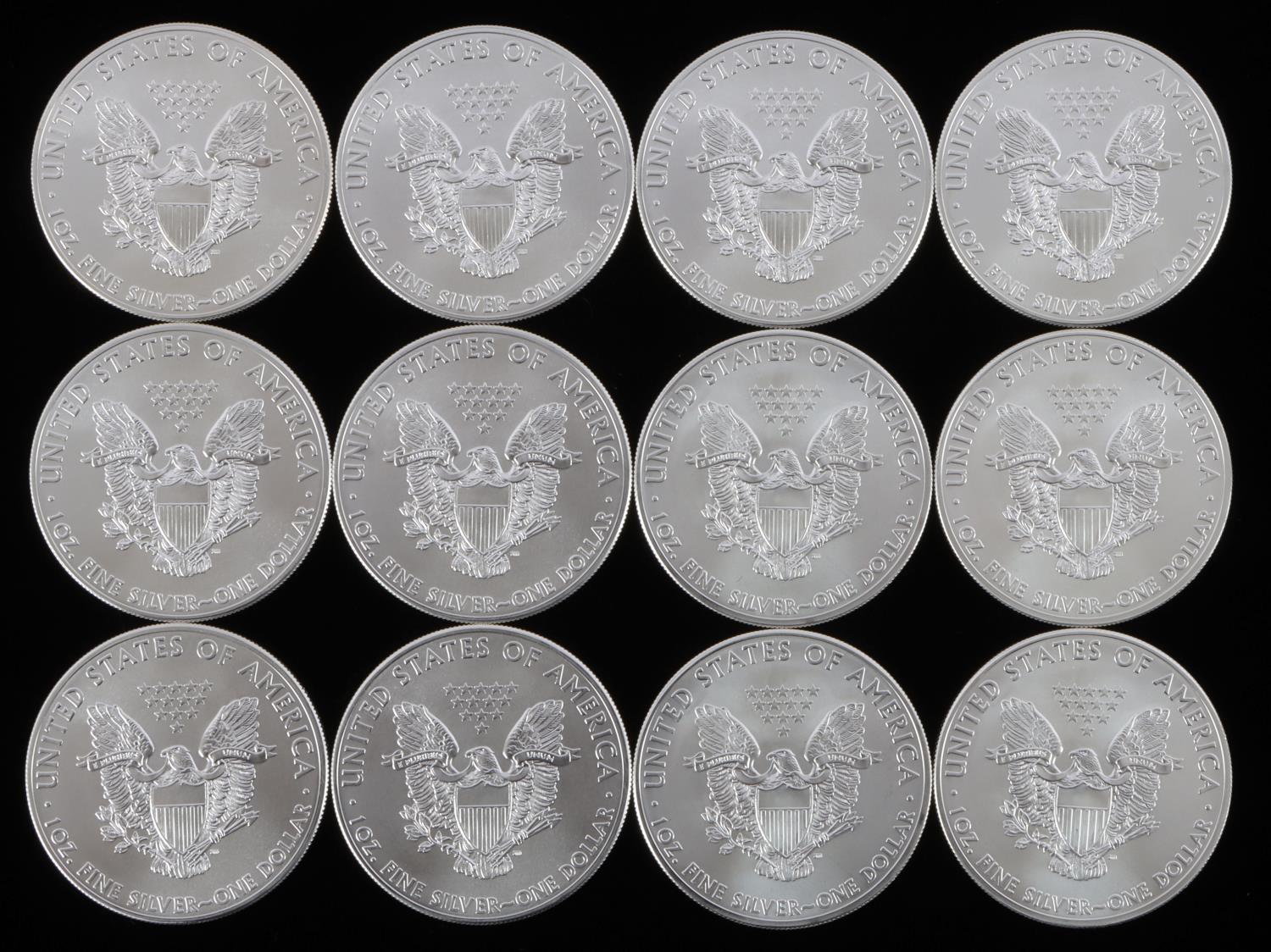 LOT OF 12 AMERICAN SILVER EAGLE 1 OZ SILVER COINS