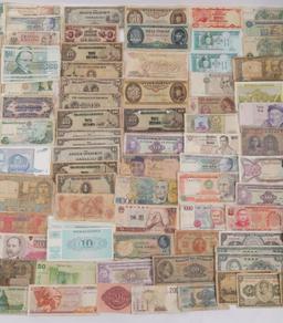 LARGE LOT OF CURRENCY FROM AROUND THE WORLD