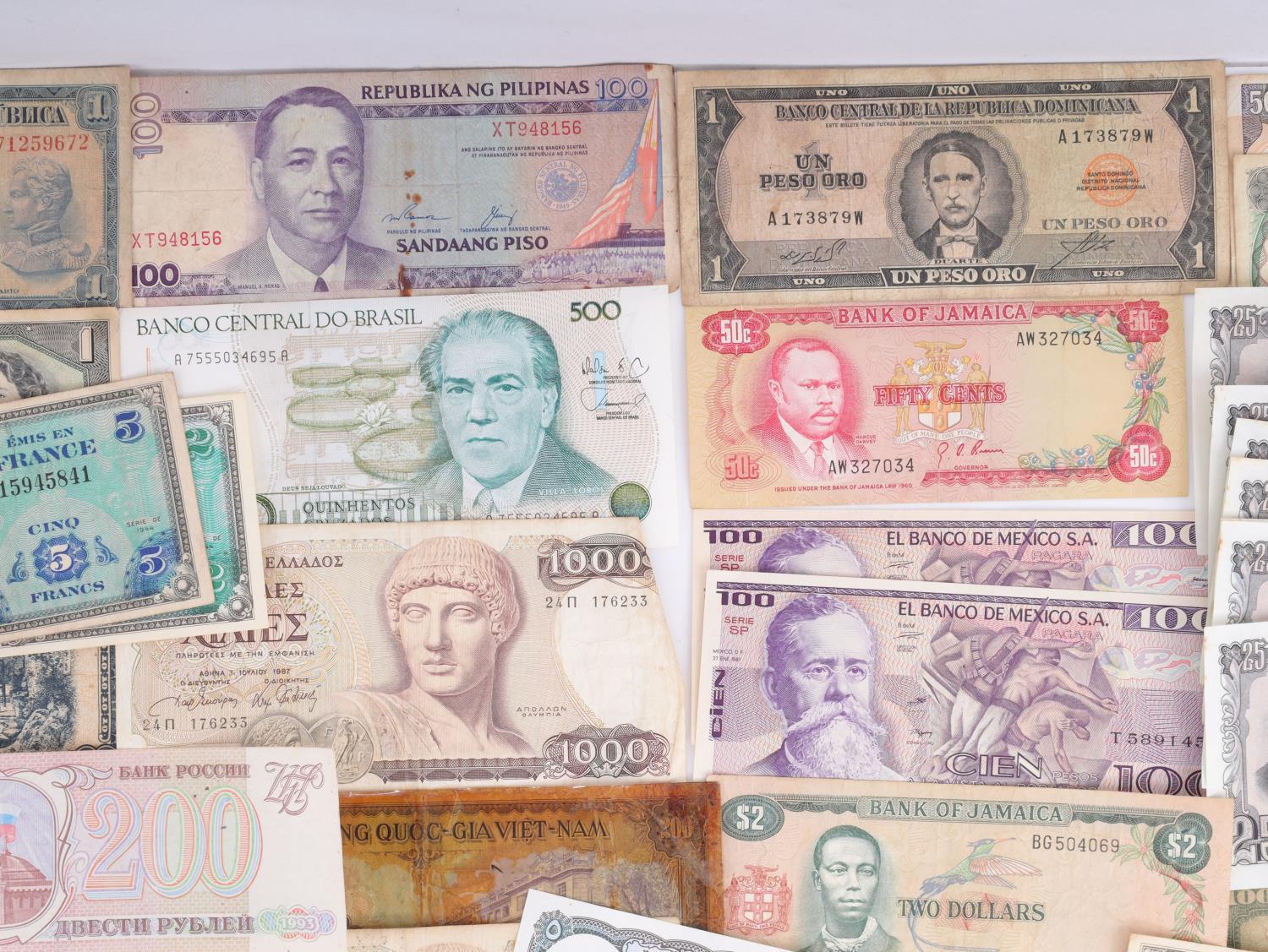 LARGE LOT OF CURRENCY FROM AROUND THE WORLD