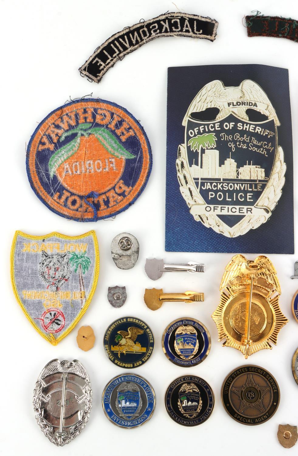 LOT OF FLORIDA POLICE BADGES AND PATCHES