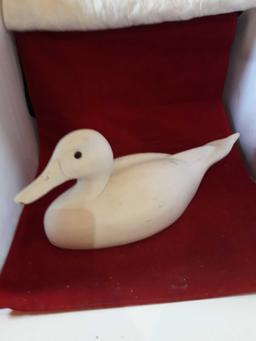 Primed wood duck decoy